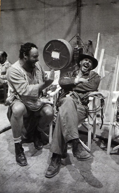 John Rhys-Davies and Harrison Ford on the set of Raiders of the Lost Ark