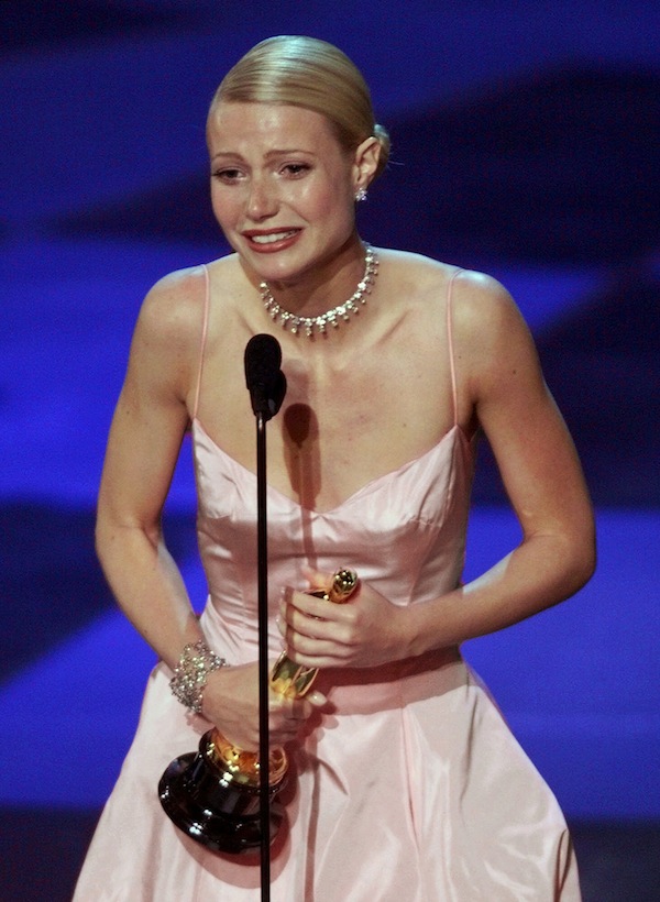 FILE - In this March 21, 1999 file photo, Gwyneth Paltrow accepts the Oscar for best actress for her role in "Shakespeare in Love," during the 71st Annual Academy Awards in Los Angeles. (AP Photo/Eric Draper, file)