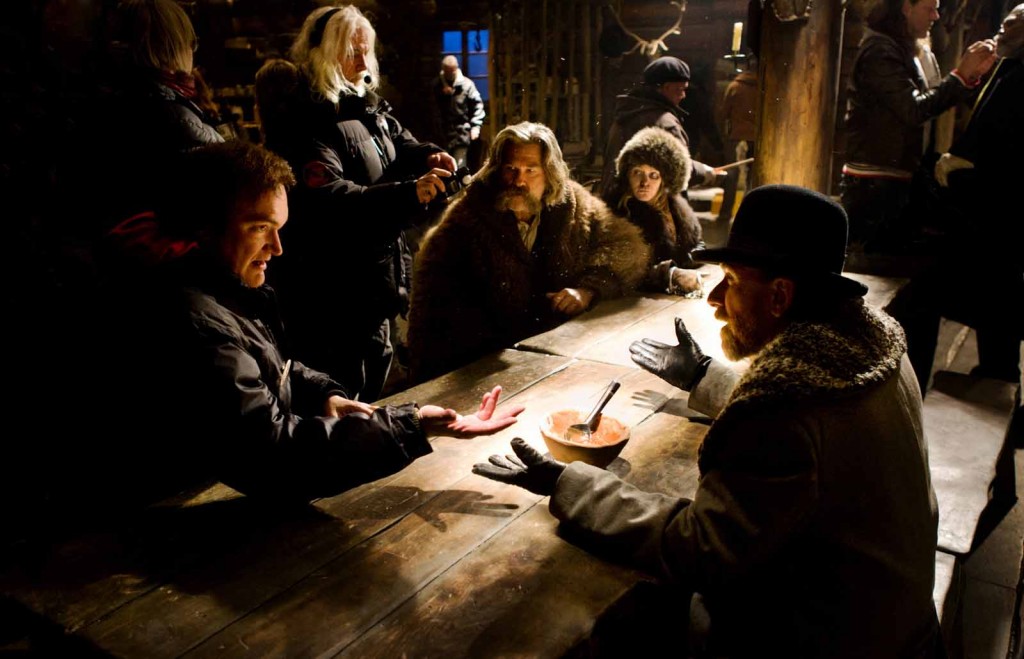 (L-R) QUENTIN TARANTINO directs KURT RUSSELL, JENNIFER JASON LEIGH, and TIM ROTH on the set of THE HATEFUL EIGHT. Photo: Andrew Cooper, SMPSP © 2015 The Weinstein Company. All Rights Reserved.