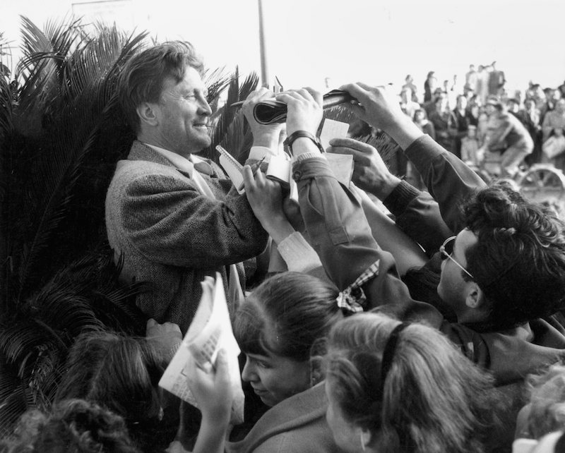 american_actor_kirk_douglas_signing_autographs_for_fans_at_the_international_cannes_film_festival_17th_april_1953._photo_by_rdagetty_images